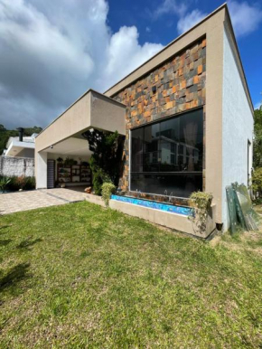 Linda Casa 4 quartos com piscina para família na praia de Canasvieiras